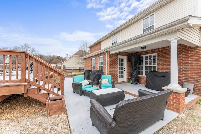 view of patio / terrace with area for grilling, outdoor lounge area, a deck, and fence