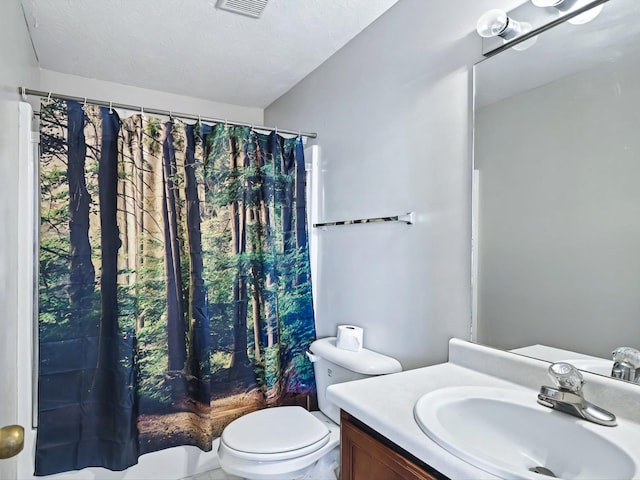 bathroom with visible vents, toilet, vanity, and a shower with curtain