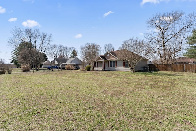 view of yard featuring fence