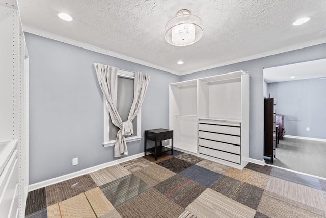 bedroom with baseboards, a textured ceiling, and crown molding