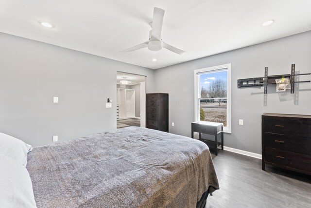 bedroom featuring recessed lighting, connected bathroom, baseboards, and ceiling fan