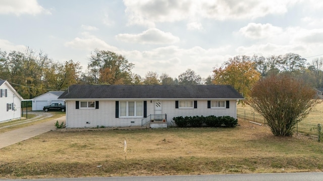 single story home with brick siding, a front yard, and fence