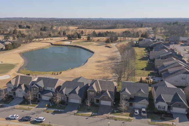 birds eye view of property featuring a residential view and a water view