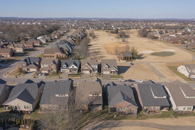 birds eye view of property with a residential view