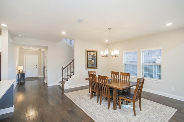 dining area with visible vents, stairway, an inviting chandelier, baseboards, and dark wood-style flooring