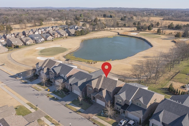 aerial view with a residential view and a water view