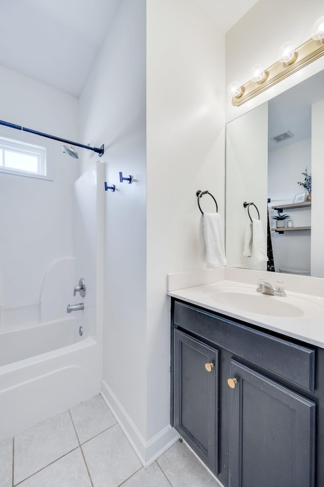 bathroom with visible vents, baseboards, tile patterned floors, vanity, and  shower combination