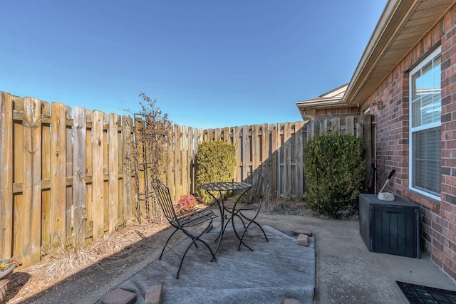 view of patio / terrace with fence