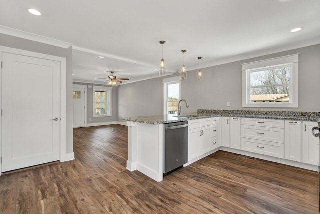 kitchen with dark wood finished floors, white cabinetry, a peninsula, crown molding, and dishwasher