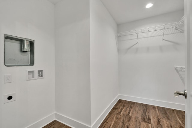 washroom with laundry area, hookup for a washing machine, electric dryer hookup, and dark wood-style flooring