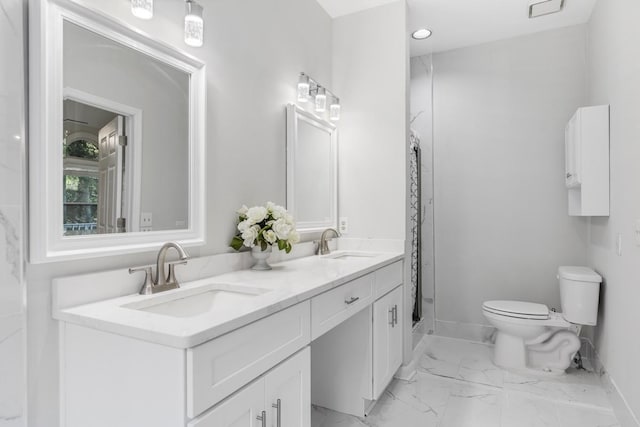 bathroom with a sink, baseboards, toilet, and marble finish floor