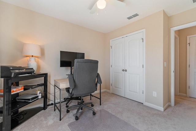 office with visible vents, ceiling fan, baseboards, and carpet