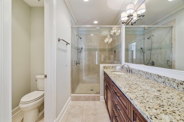 full bath featuring vanity, baseboards, a stall shower, ornamental molding, and toilet