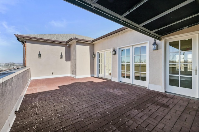 view of patio featuring french doors