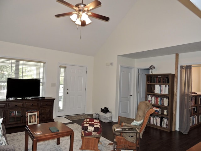 living room featuring high vaulted ceiling, wood finished floors, and a ceiling fan