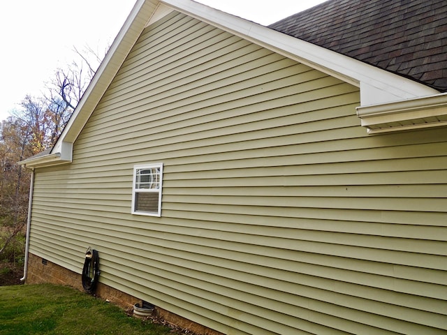 view of home's exterior featuring a shingled roof