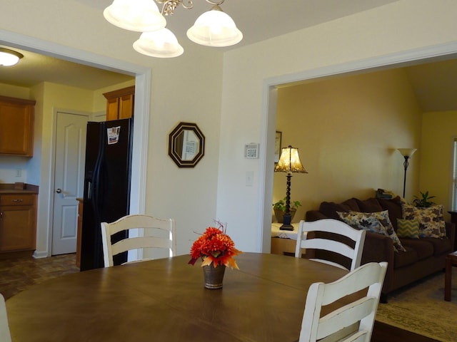 dining area with a notable chandelier