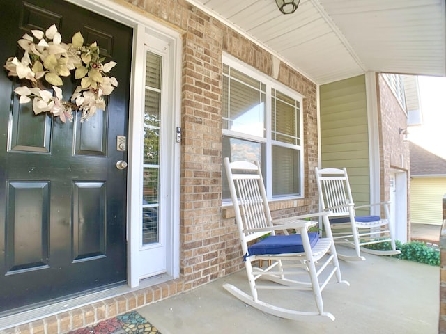 1016 Sunset Dr, Clarksville, TN 37040 - view of exterior entry with brick siding and covered porch