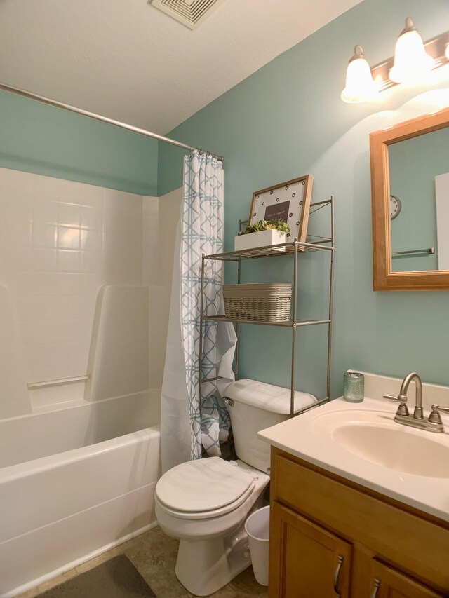 1016 Sunset Dr, Clarksville, TN 37040 - full bathroom with tile patterned floors, visible vents, toilet, shower / tub combo, and vanity