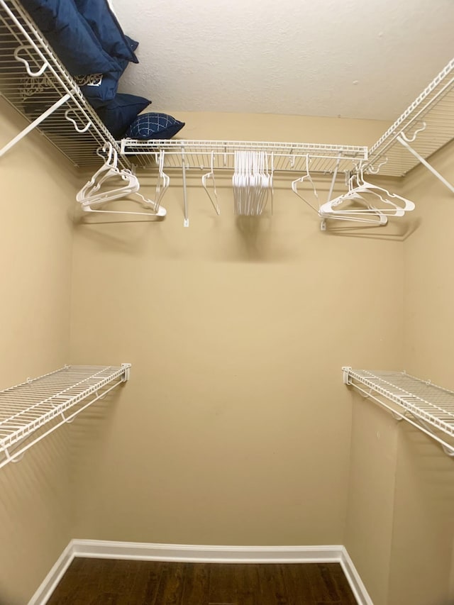 1016 Sunset Dr, Clarksville, TN 37040 - spacious closet featuring dark wood-style floors