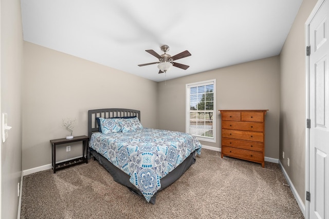 bedroom featuring carpet flooring, a ceiling fan, and baseboards