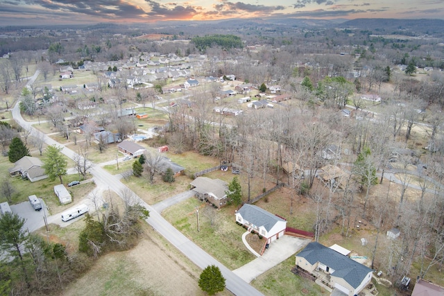 birds eye view of property with a residential view