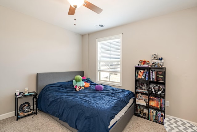 bedroom featuring a ceiling fan, carpet, and visible vents