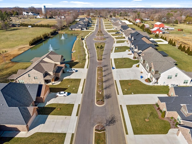 aerial view with a residential view and a water view