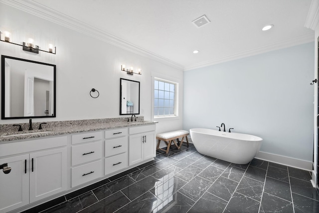 full bathroom featuring double vanity, a soaking tub, crown molding, and a sink