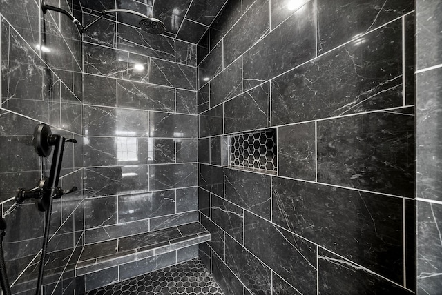 details with a tile shower