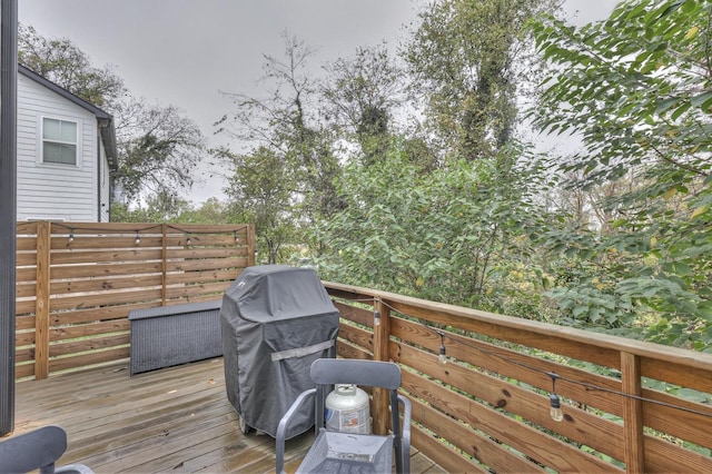 wooden deck with area for grilling