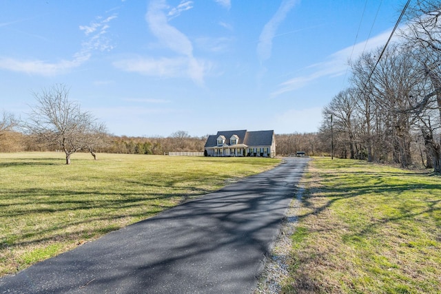 view of road featuring driveway