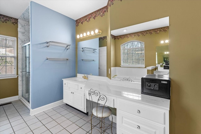 bathroom featuring tile patterned floors, visible vents, a stall shower, baseboards, and vanity