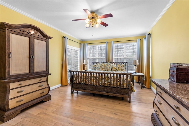 bedroom featuring a ceiling fan, light wood-type flooring, baseboards, and ornamental molding