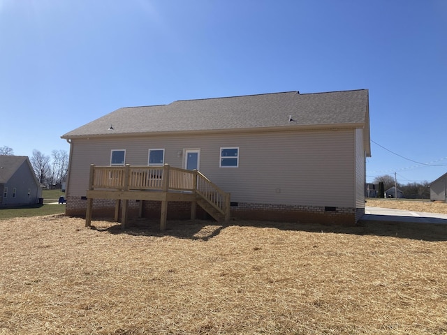 back of house featuring a wooden deck, stairway, and crawl space