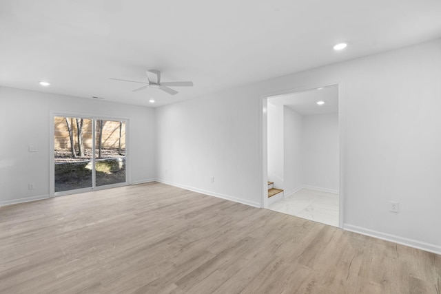 spare room with light wood-style floors, recessed lighting, baseboards, and ceiling fan