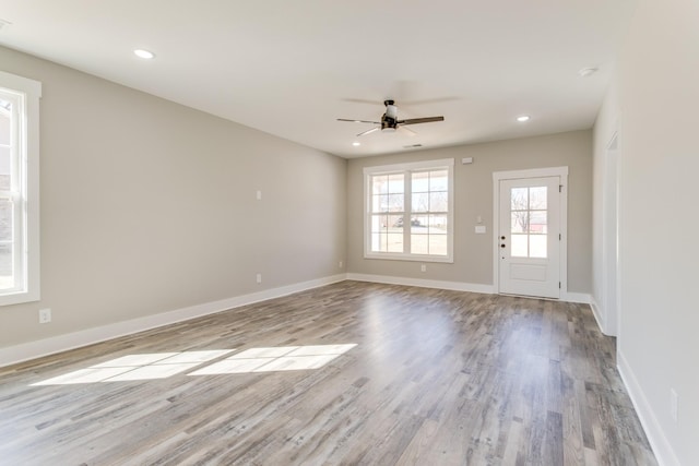 unfurnished room with recessed lighting, ceiling fan, baseboards, and wood finished floors