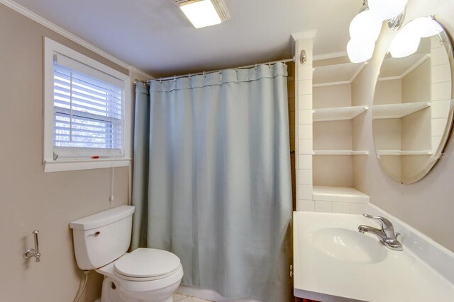 bathroom featuring a shower with shower curtain, toilet, ornamental molding, and vanity