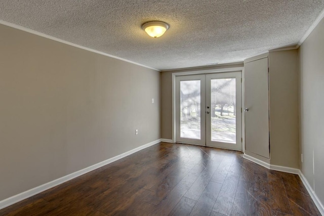 unfurnished room with ornamental molding, french doors, baseboards, and dark wood-style flooring