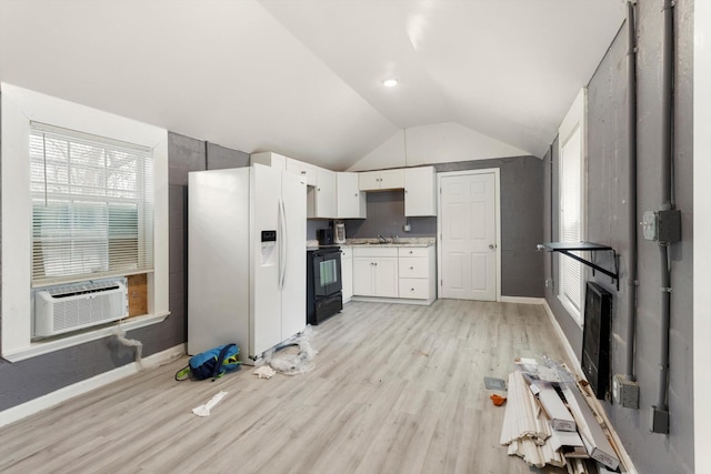 kitchen with light wood-style flooring, black electric range, white cabinetry, white fridge with ice dispenser, and lofted ceiling