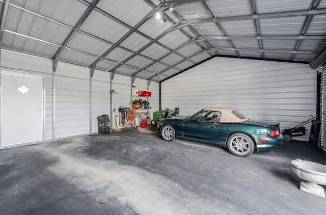 garage featuring a carport