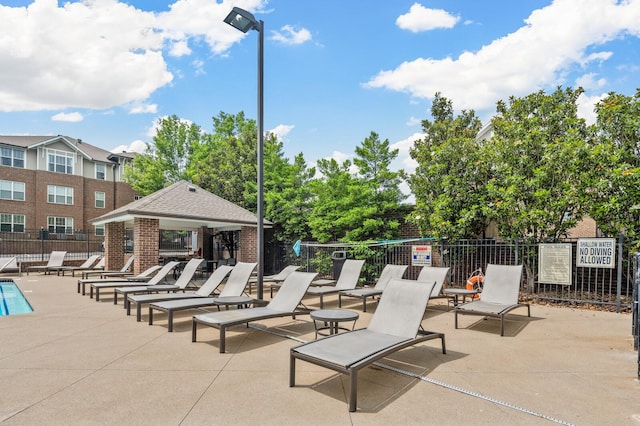 view of patio featuring a gazebo and fence