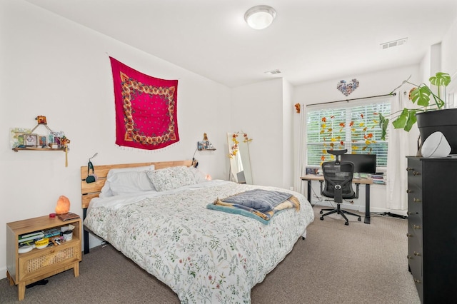 carpeted bedroom with visible vents