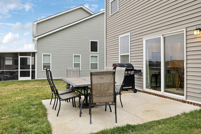 view of patio / terrace featuring outdoor dining space, area for grilling, and a sunroom