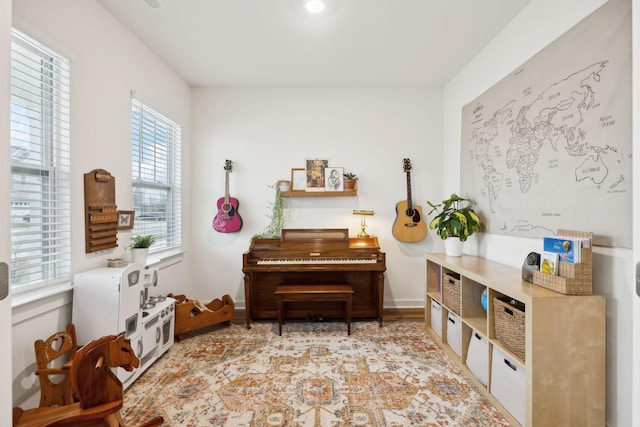 sitting room featuring baseboards