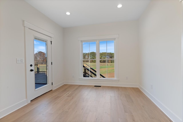 856 Tucker Rd, Dickson, TN 37055 - empty room with light wood finished floors, healthy amount of natural light, and recessed lighting