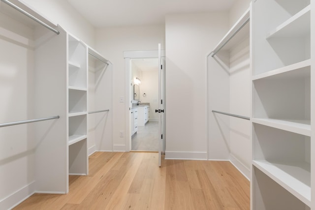 856 Tucker Rd, Dickson, TN 37055 - spacious closet featuring light wood finished floors