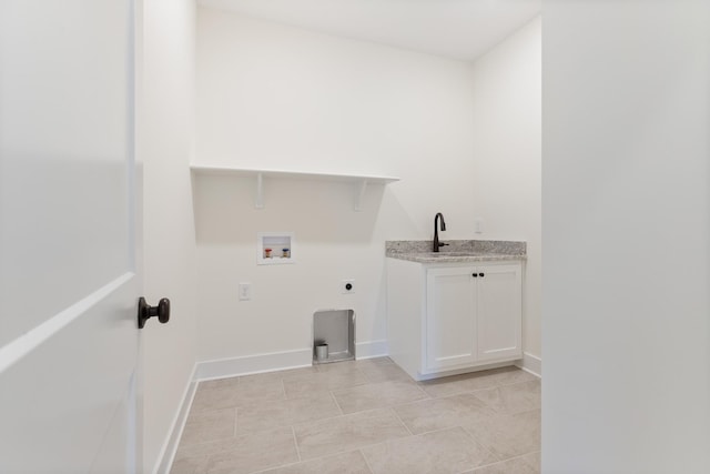 856 Tucker Rd, Dickson, TN 37055 - laundry area featuring hookup for an electric dryer, hookup for a washing machine, light tile patterned flooring, and wet bar