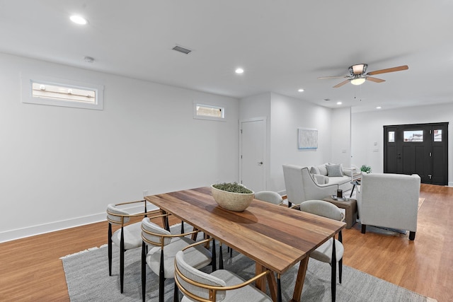 dining space featuring visible vents, light wood finished floors, baseboards, recessed lighting, and ceiling fan