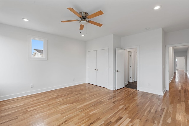 unfurnished bedroom featuring light wood finished floors, recessed lighting, a ceiling fan, and baseboards